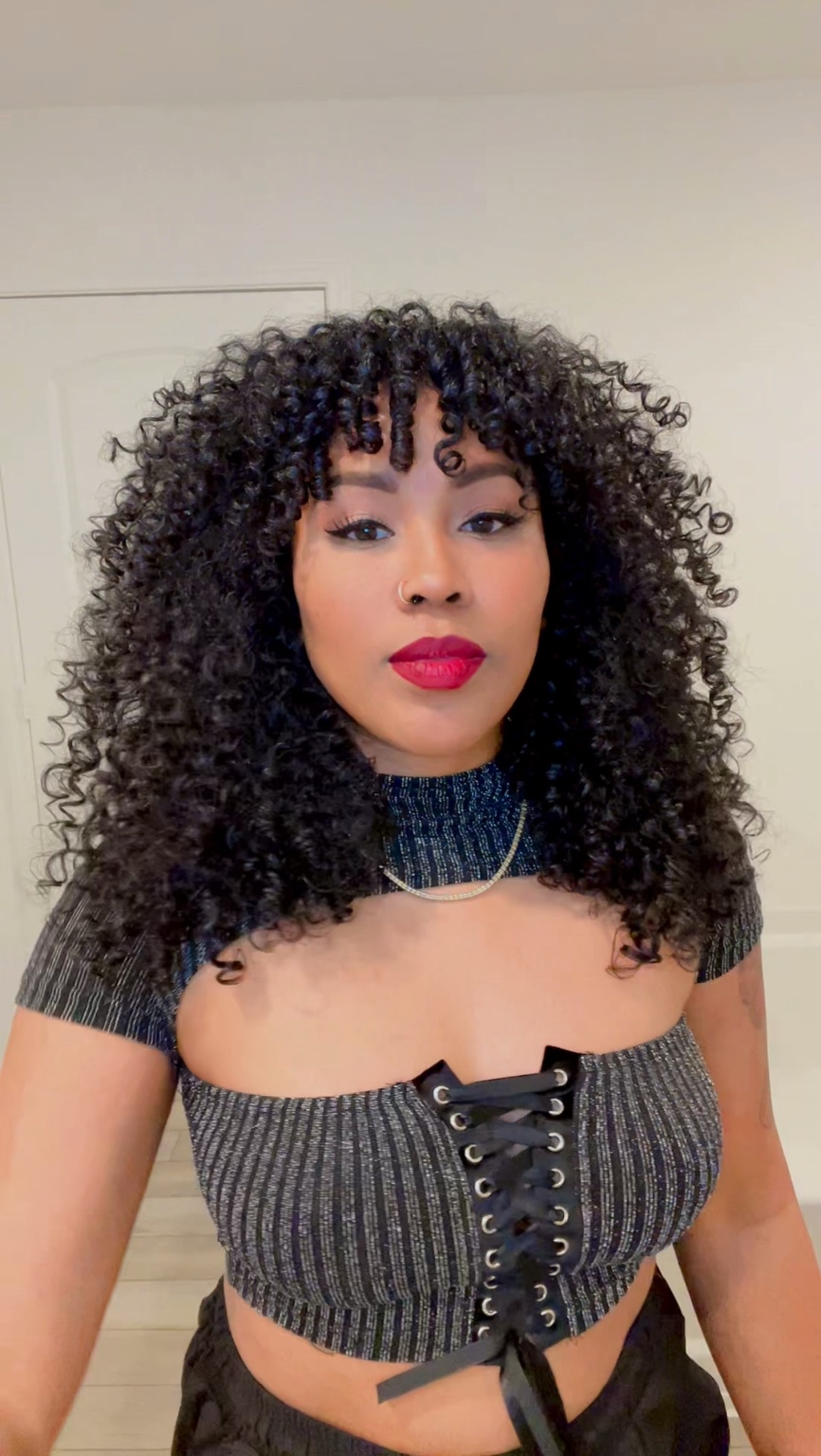 Full natural curls styled with defined ringlets