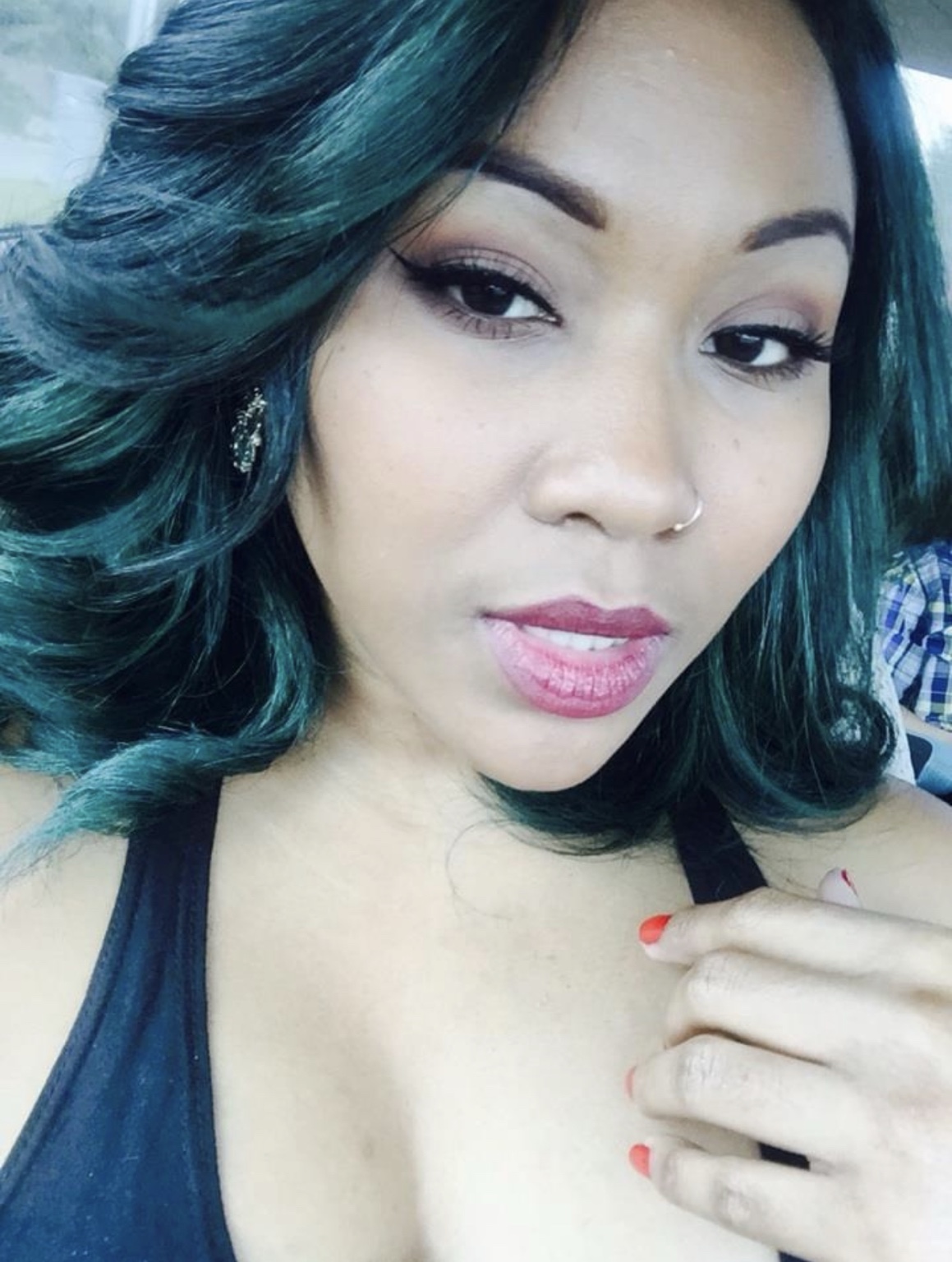 Emerald green hairstyle before the natural hair journey